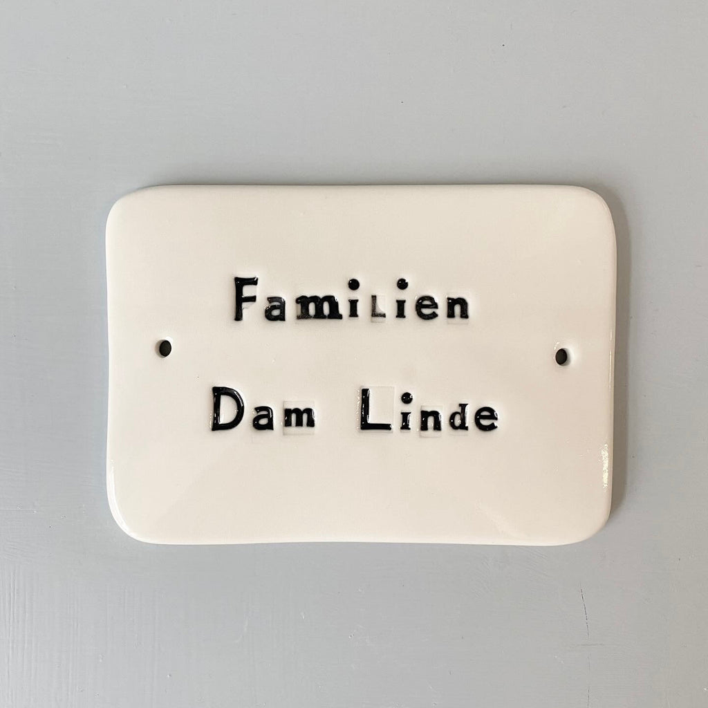 Dørskilt -  med "familien"