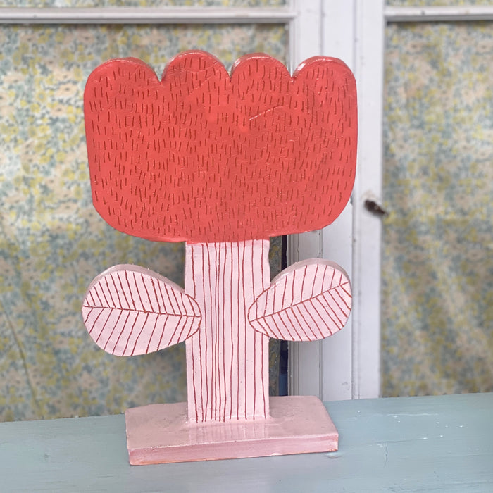stor blomst i keramik